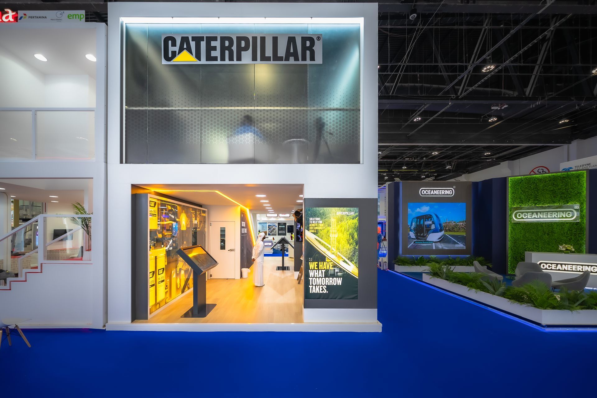 Caterpillar 50 + 40 sqm exhibition stand at ADIPEC by Messe.ae
