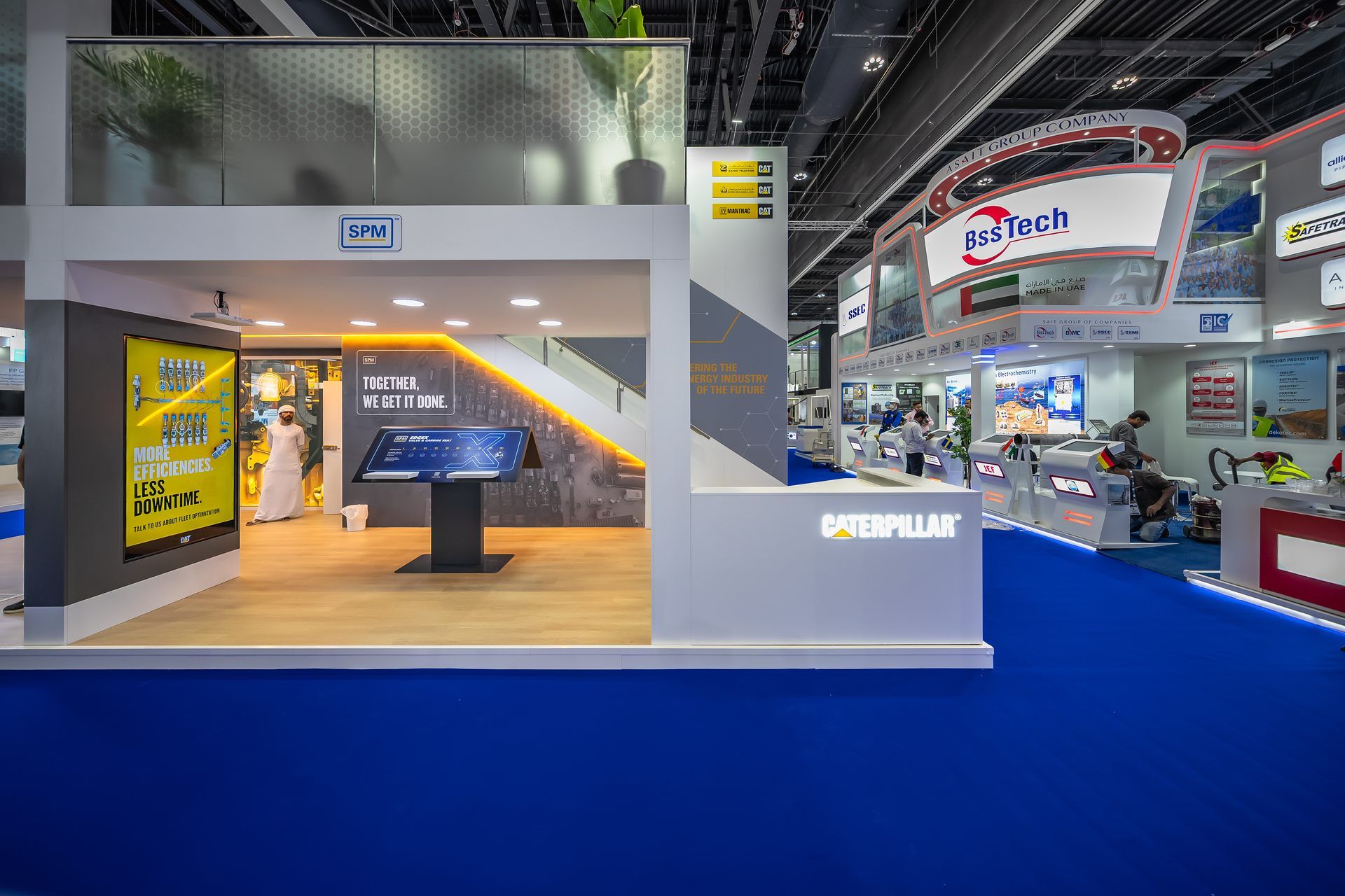 Caterpillar 50 + 40 sqm exhibition stand at ADIPEC by Messe.ae
