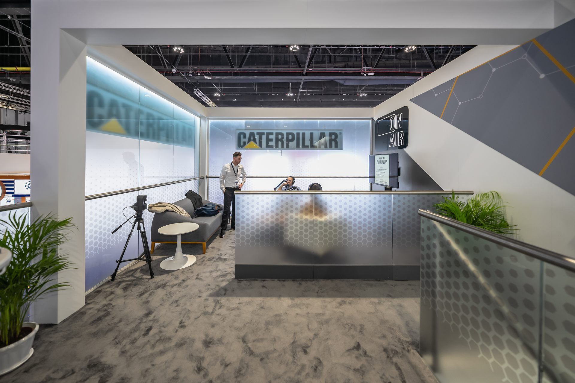 Caterpillar 50 + 40 sqm exhibition stand at ADIPEC by Messe.ae