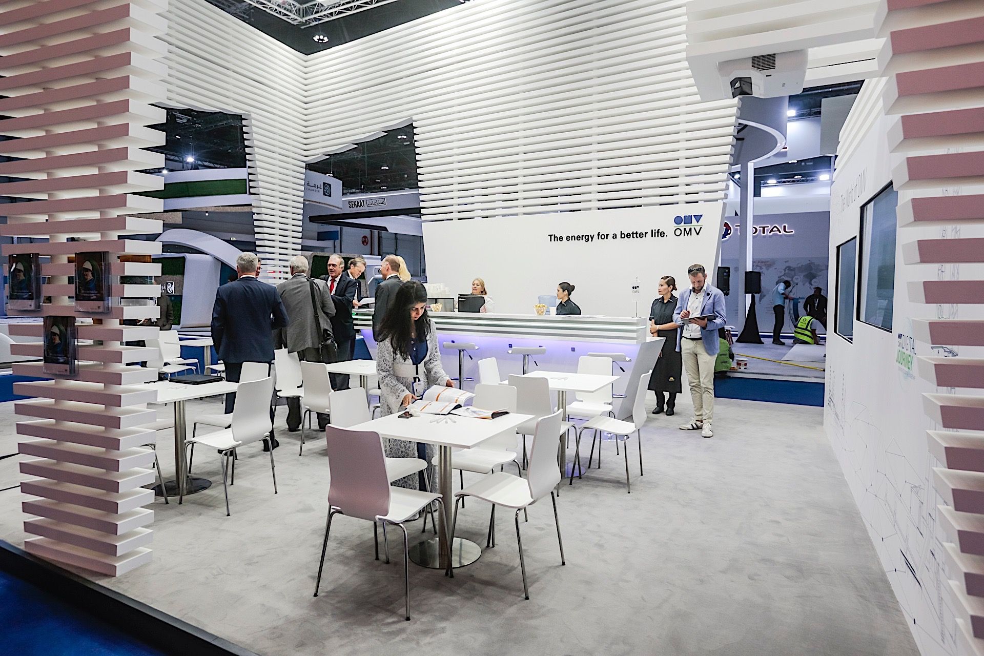 OMV 105 sqm exhibition stand at ADIPEC & WEC by Messe.ae