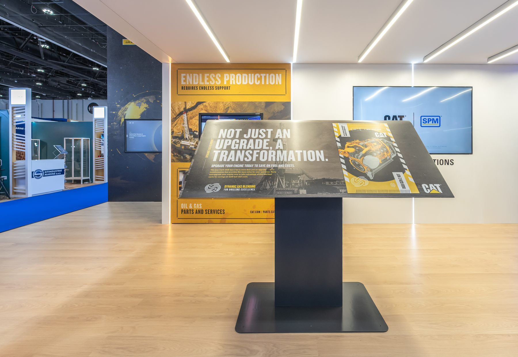 Caterpillar 50 + 40 sqm exhibition stand at ADIPEC by Messe.ae