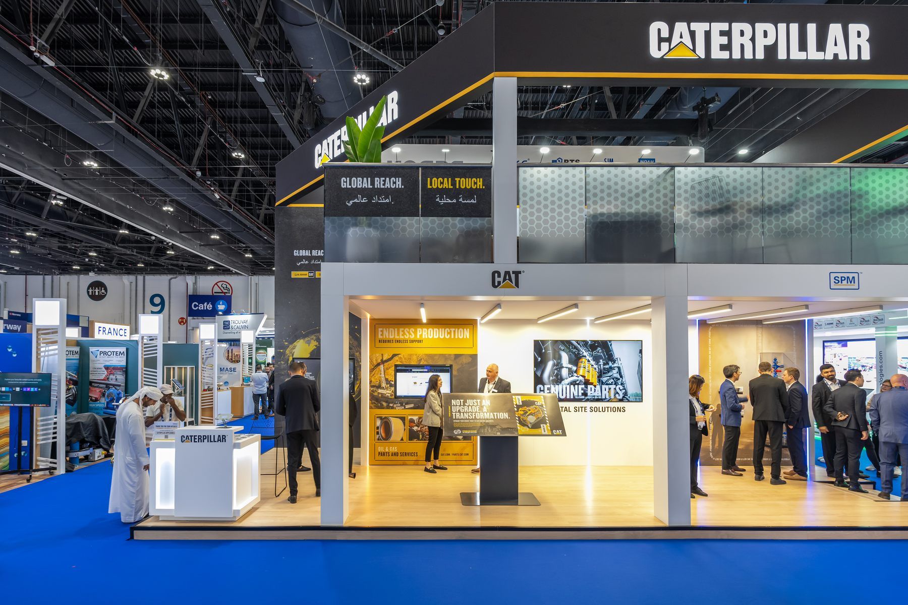 Caterpillar 50 + 40 sqm exhibition stand at ADIPEC by Messe.ae