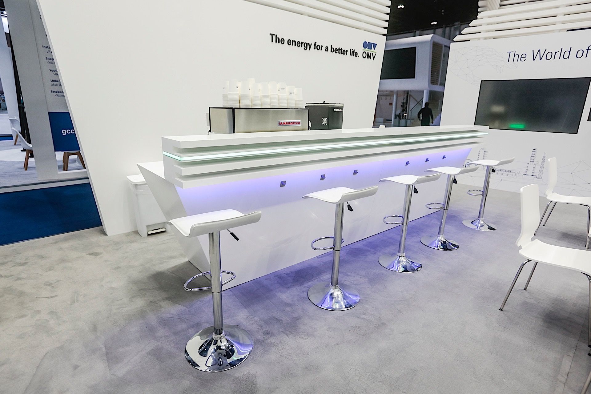 OMV 105 sqm exhibition stand at ADIPEC & WEC by Messe.ae