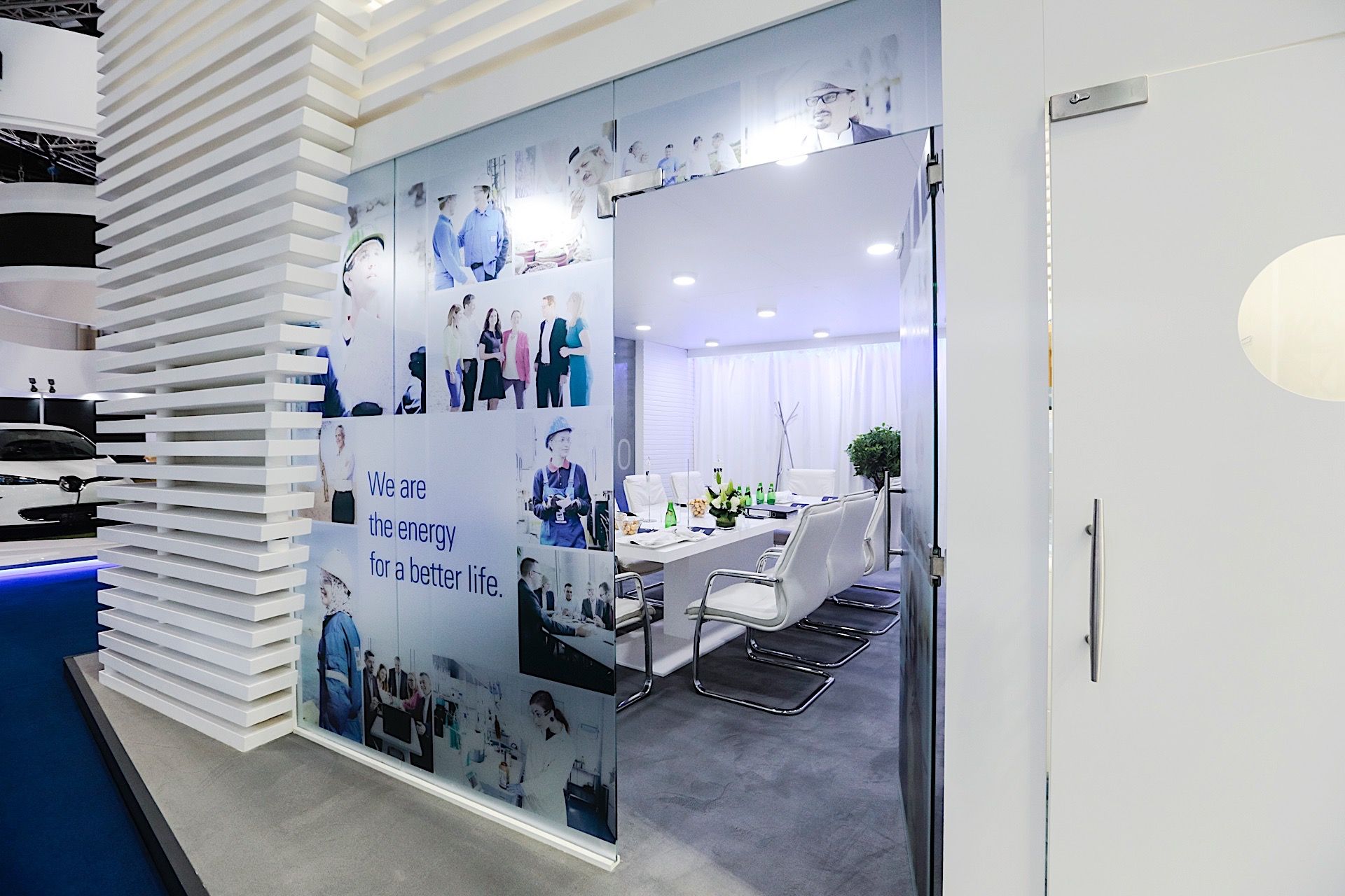 OMV 105 sqm exhibition stand at ADIPEC & WEC by Messe.ae