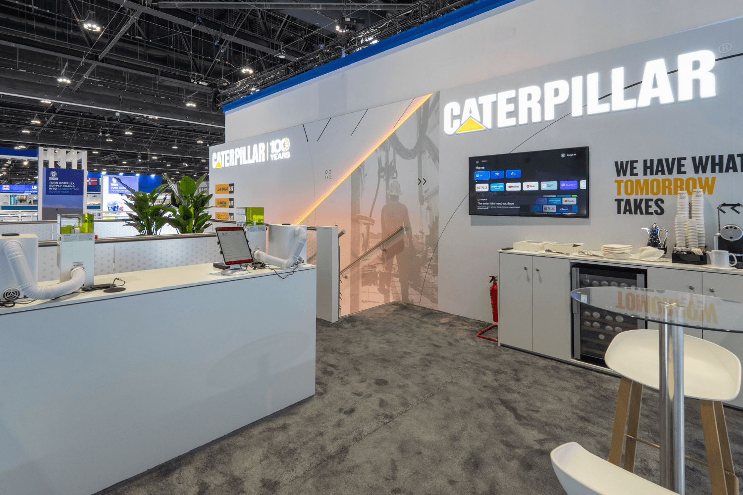 Caterpillar 50 + 33 sqm exhibition stand at ADIPEC by Messe.ae